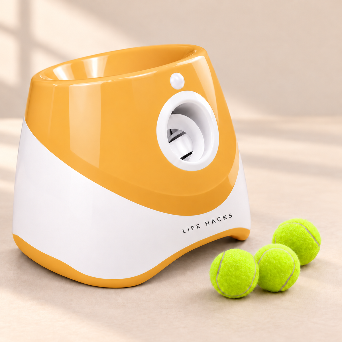 Orange LIFE HACKS automatic dog ball launcher with three 2-inch mini tennis balls